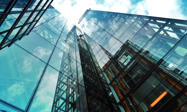 exterior of building looking up to clouds