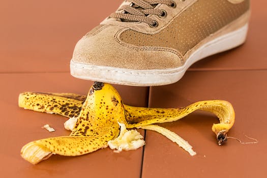 foot stepping on banana peel