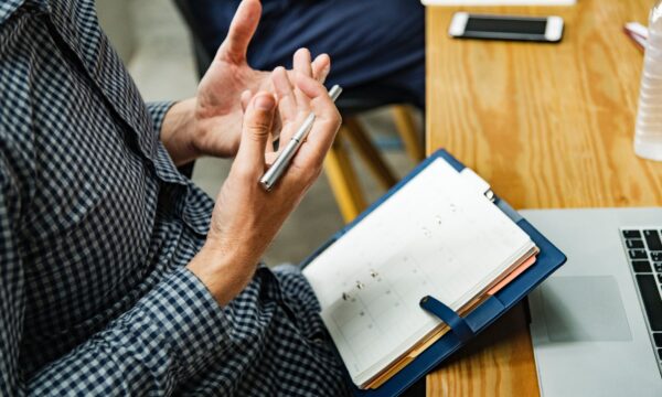 worker at table with planner