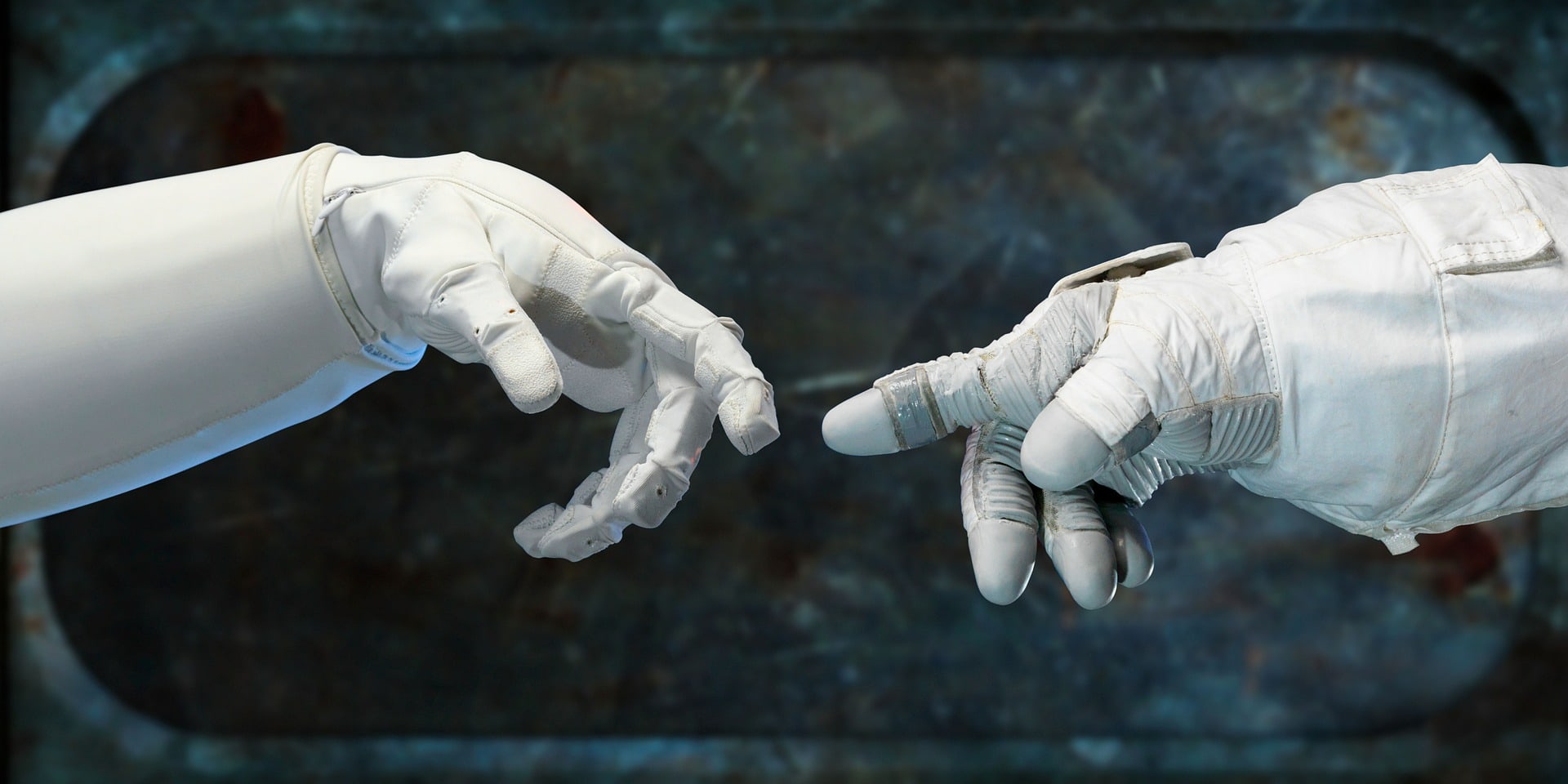 astronaut fingers touching