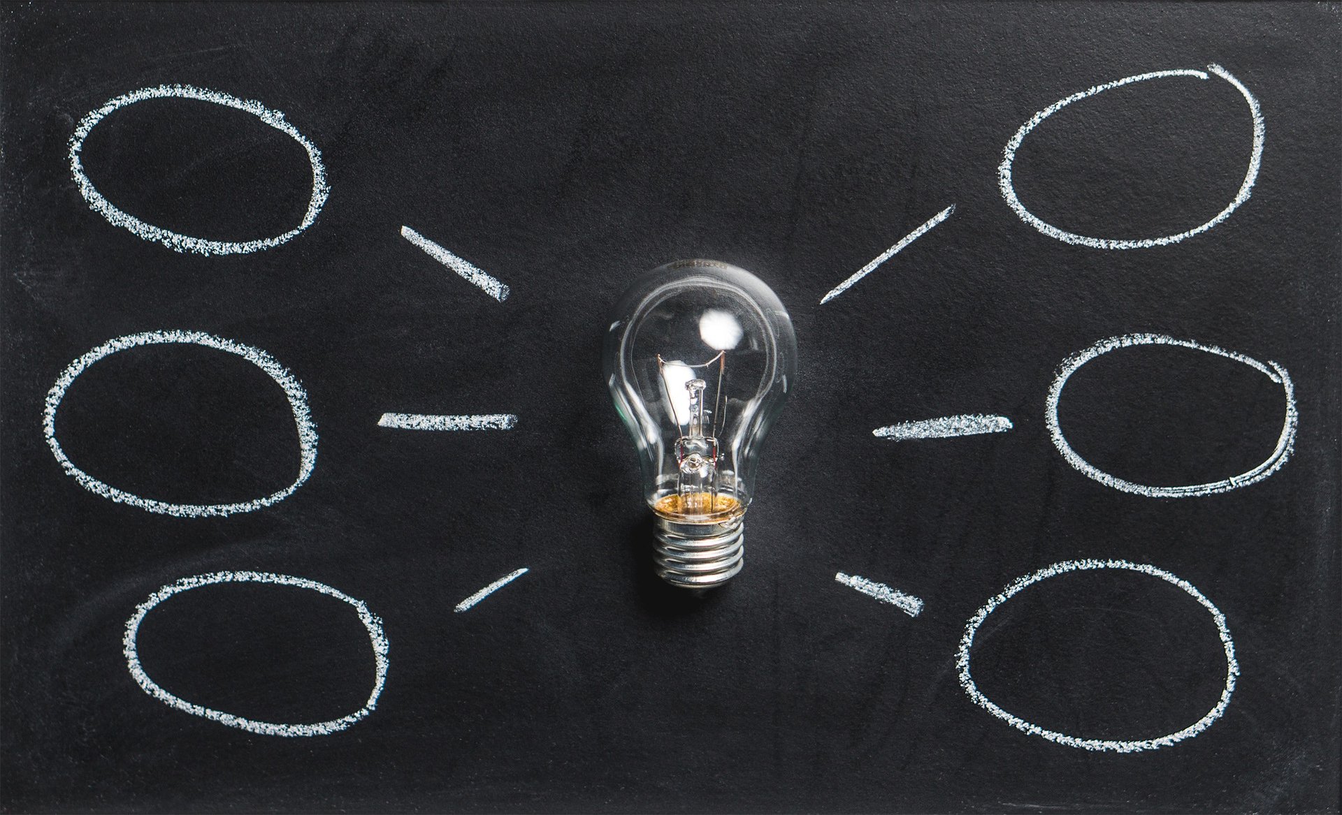Lightbulb leading to thought bubbles