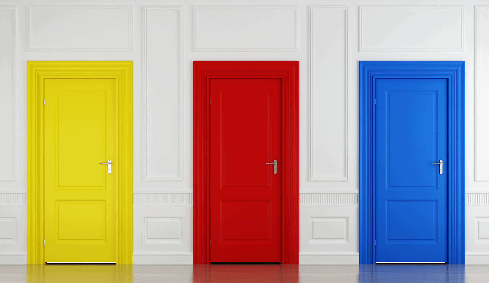 Photo of white wall with three doors set into it: bright yellow on the left, true red in the center, and sky-blue on the right